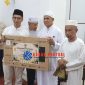 ‎Bupati Karimun, Ing H. Iskandarsyah menyerahkan bantuan TV Digital kepada Pengurus Masjid Jamiatun Najah.